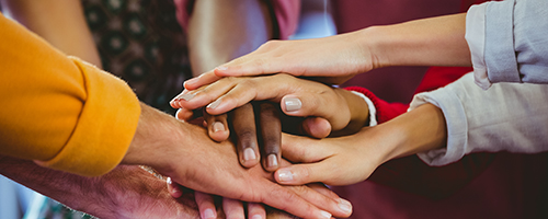 Focus on hands together at work
